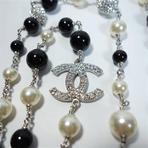 chanel black and white pearls|Chanel long necklace with pearls.